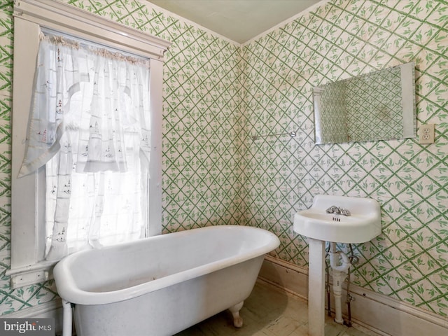 bathroom featuring a tub