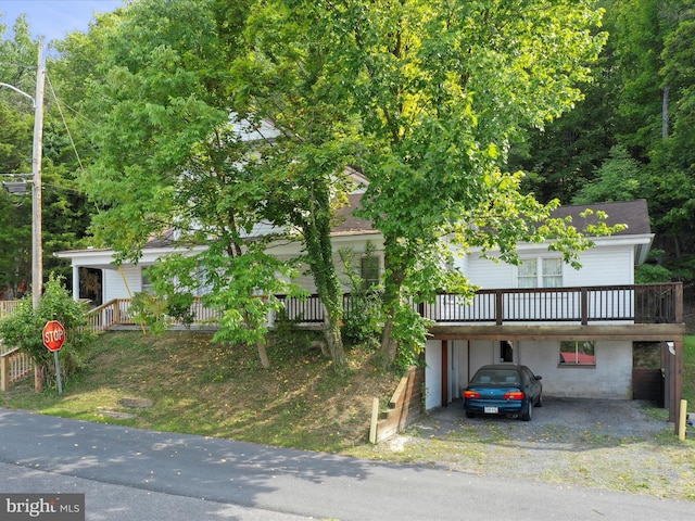 view of front of house featuring a wooden deck