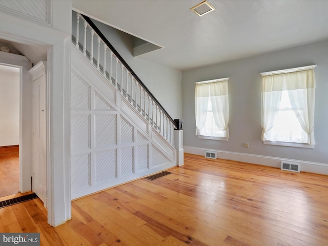 entrance foyer with light hardwood / wood-style floors