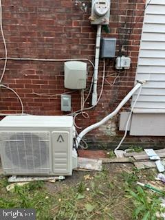 utility room featuring ac unit