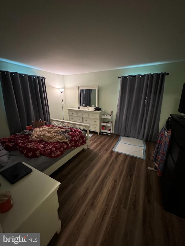 bedroom featuring hardwood / wood-style floors