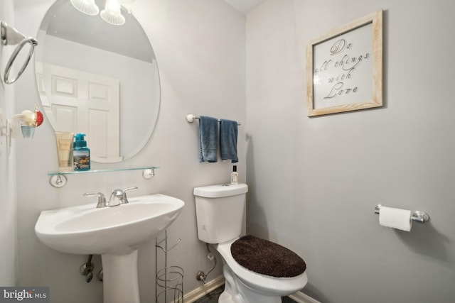 bathroom featuring toilet