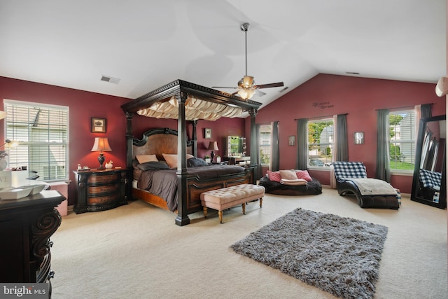 bedroom featuring vaulted ceiling, ceiling fan, and carpet flooring