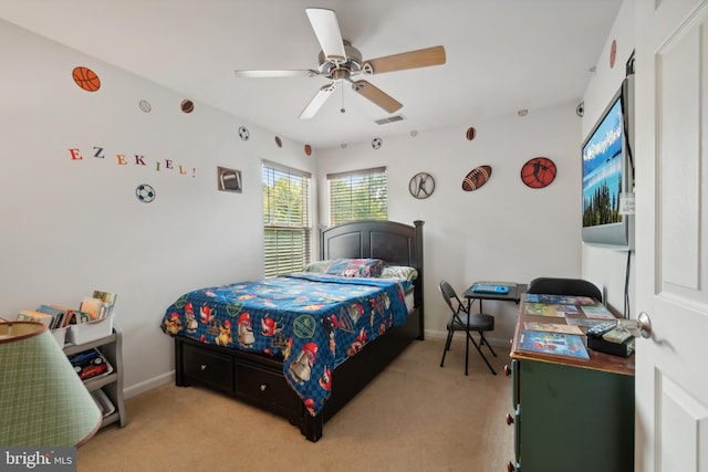 carpeted bedroom with ceiling fan