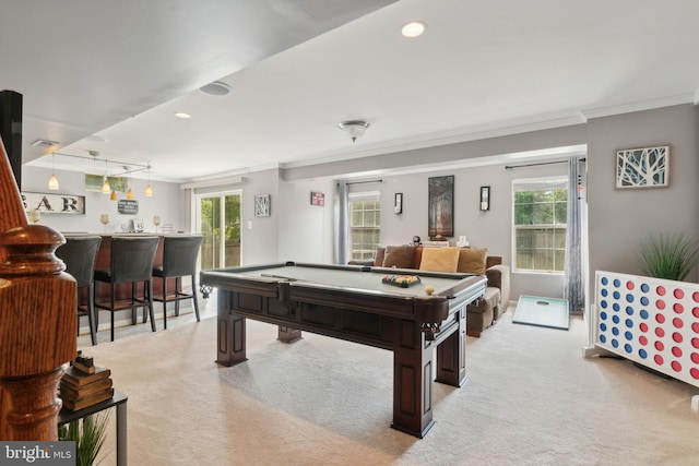 game room featuring bar, light colored carpet, crown molding, and billiards