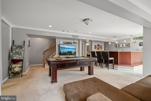 playroom featuring billiards, light carpet, bar, and ornamental molding