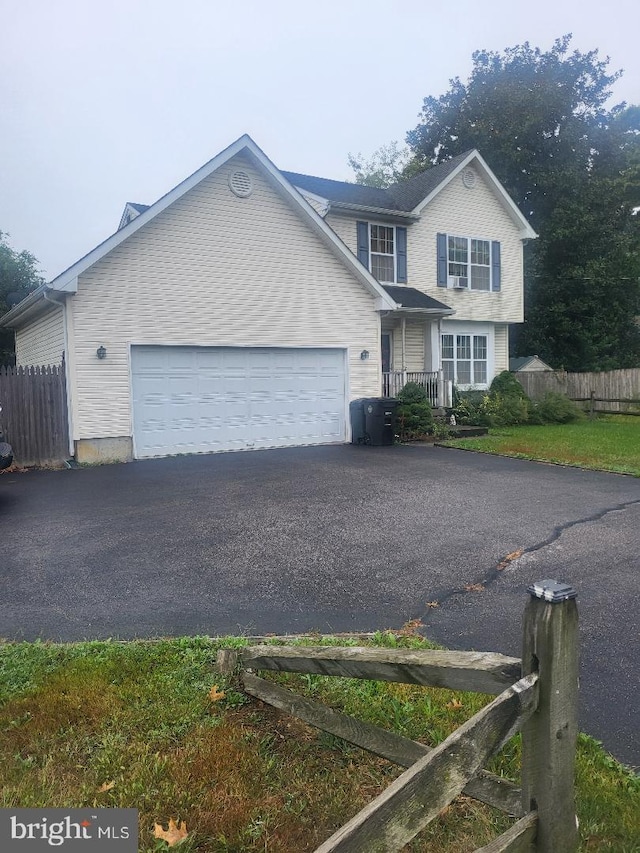 view of front of home featuring a garage