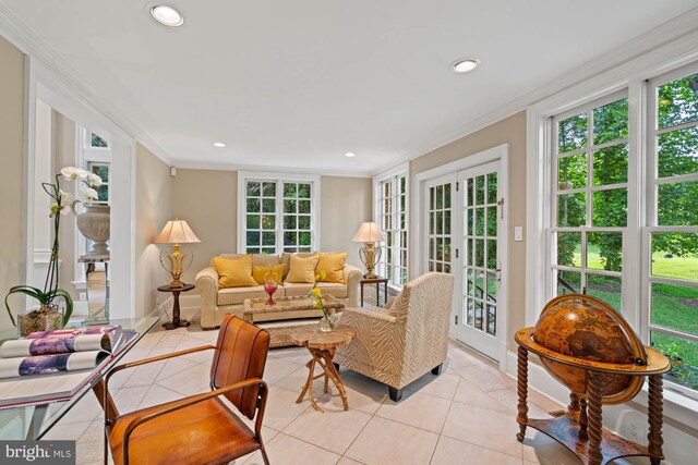 tiled living room featuring crown molding