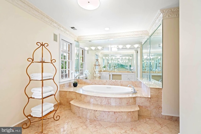 bathroom featuring tiled bath, ornamental molding, and vanity