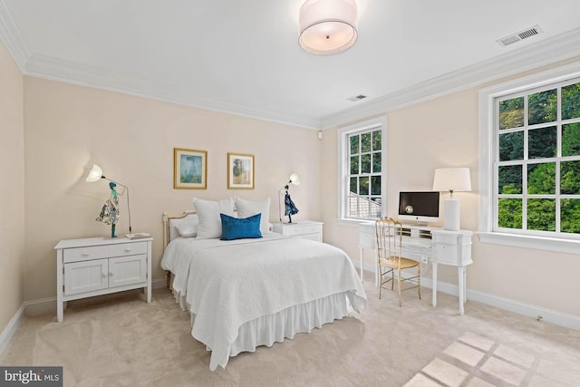 bedroom with ornamental molding, light colored carpet, and visible vents