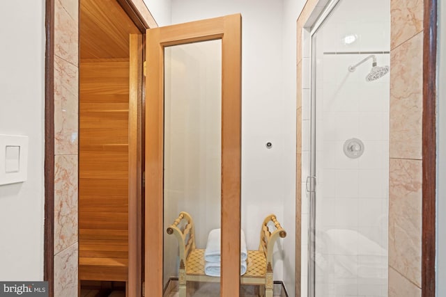 bathroom featuring a sauna and a stall shower