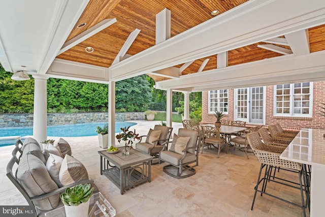 view of patio / terrace featuring an outdoor hangout area, a gazebo, outdoor dining area, and an outdoor pool