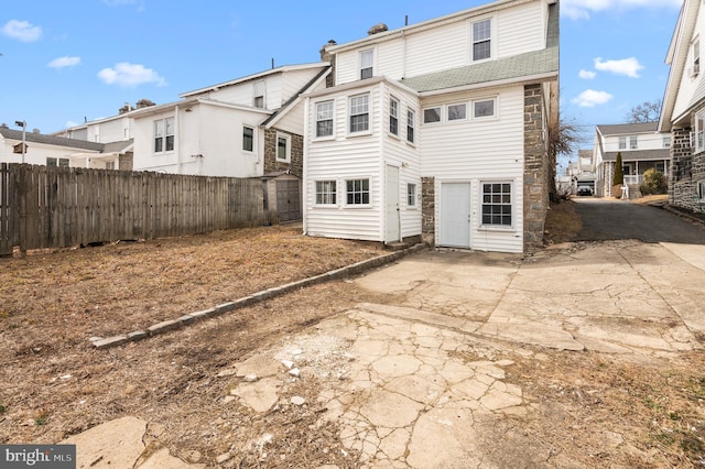 rear view of property with a patio area