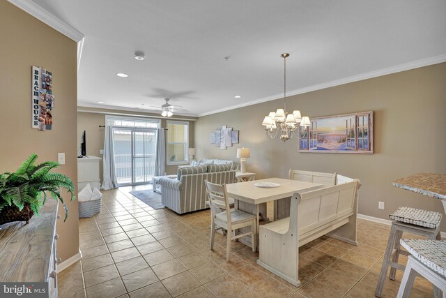 kitchen featuring light tile patterned floors, light stone countertops, a breakfast bar, appliances with stainless steel finishes, and a center island with sink