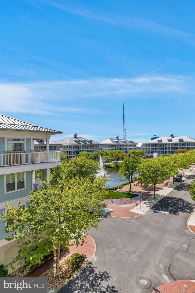 view of building exterior featuring a water view