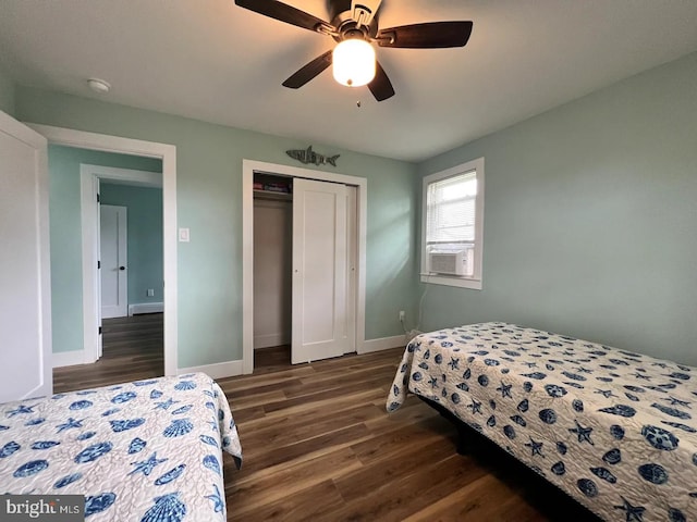 bedroom with ceiling fan, dark hardwood / wood-style floors, a closet, and cooling unit