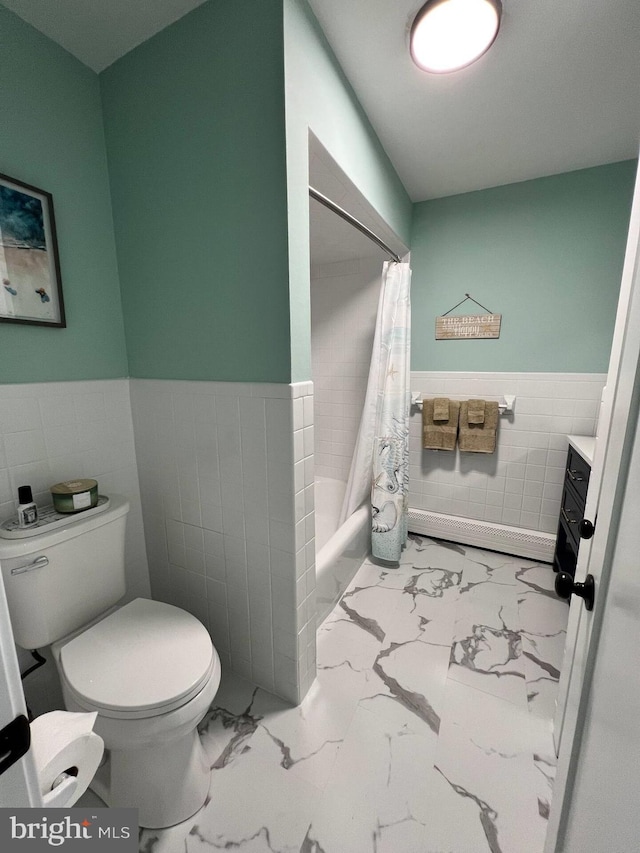 full bathroom featuring toilet, vanity, tile patterned floors, tile walls, and shower / bathtub combination with curtain