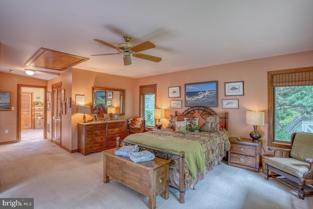 carpeted bedroom featuring ceiling fan