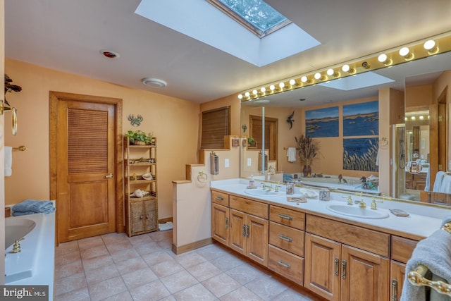 130 Mcfee St, Lewes, DE 19958 - full bath featuring a skylight, a garden tub, double vanity, an enclosed shower, and tile patterned flooring