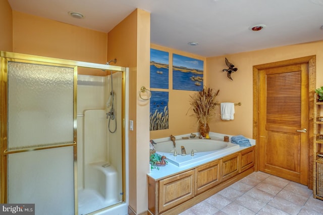 130 Mcfee St, Lewes, DE 19958 - bathroom featuring a stall shower, a bath, and tile patterned floors