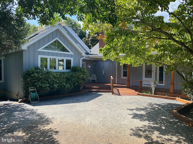 view of front of property featuring a wooden deck