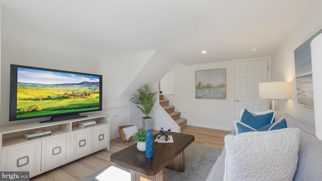 living room with light hardwood / wood-style floors