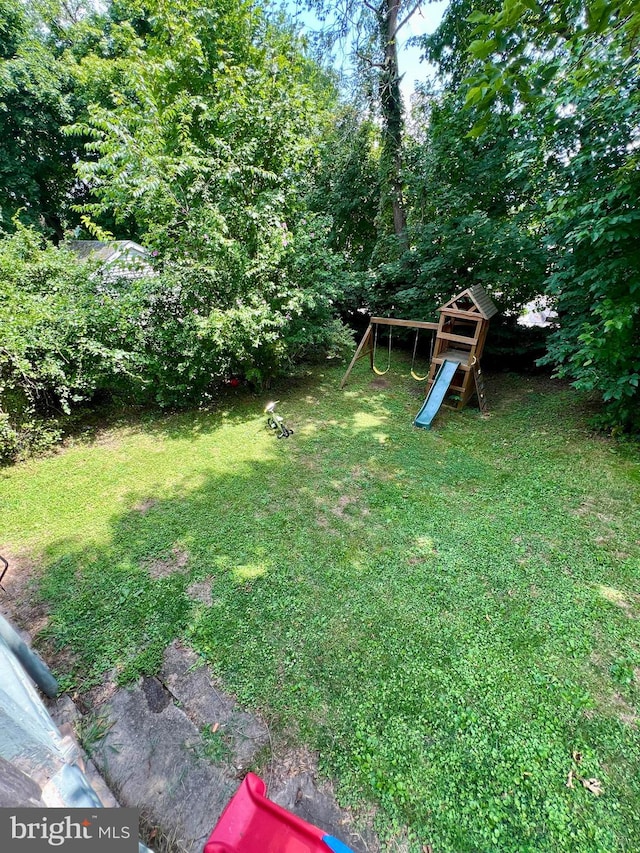 view of yard featuring a playground