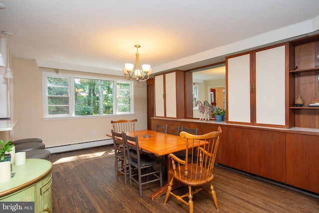 dining space featuring dark hardwood / wood-style floors, an inviting chandelier, and baseboard heating