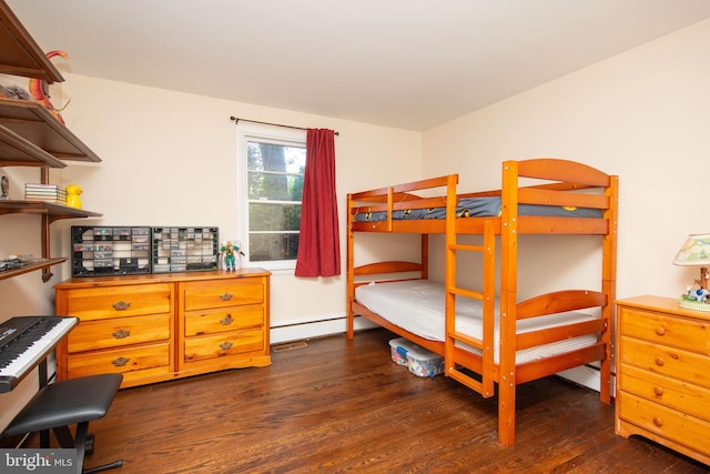 bedroom featuring a baseboard radiator and dark hardwood / wood-style flooring