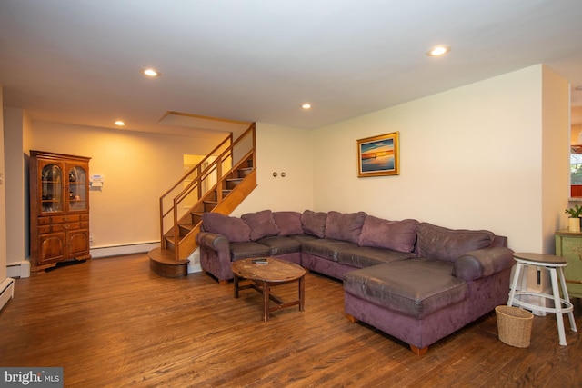 living room with a baseboard radiator and hardwood / wood-style flooring