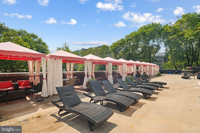 view of patio featuring a gazebo and outdoor lounge area