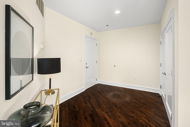 interior space with hardwood / wood-style flooring