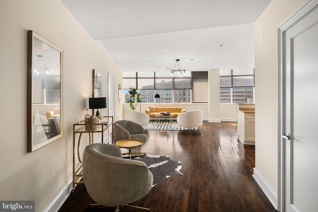 interior space featuring dark hardwood / wood-style floors and a chandelier