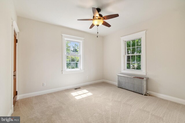 kitchen with stainless steel appliances, white cabinets, a wealth of natural light, and sink