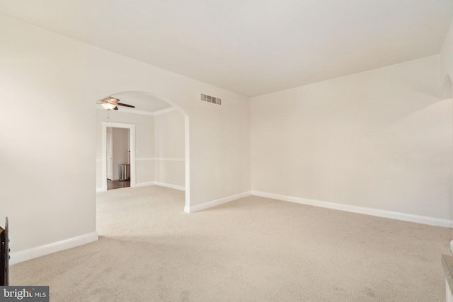 carpeted empty room with ceiling fan