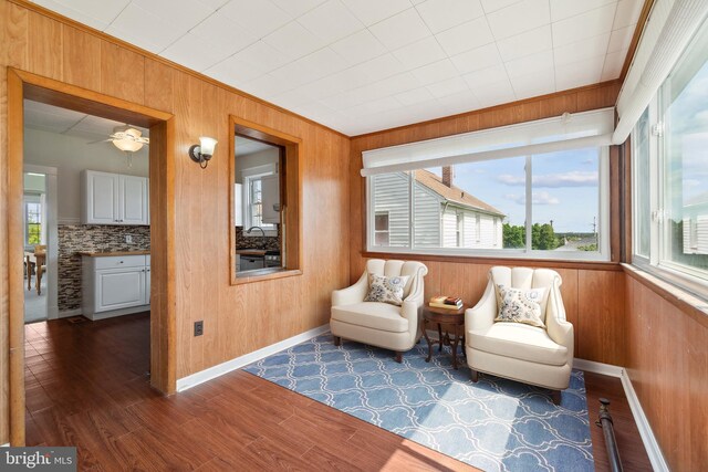 bonus room with a textured ceiling, lofted ceiling, and carpet