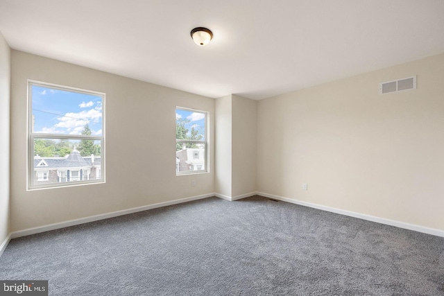 view of carpeted spare room