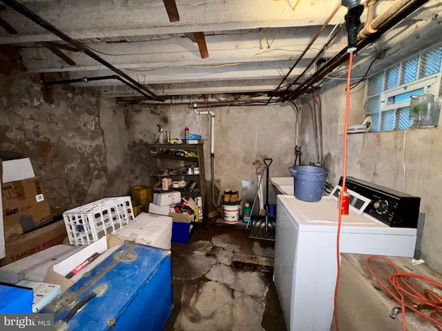 basement with washer and clothes dryer