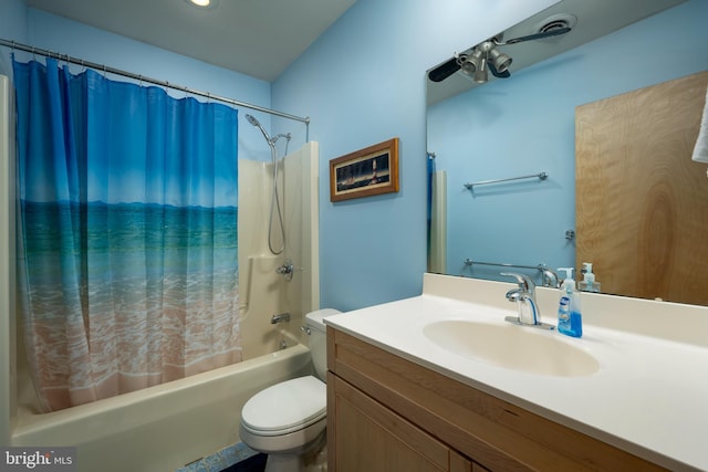 full bathroom featuring toilet, shower / tub combo, and vanity