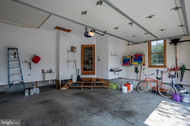 garage featuring a garage door opener