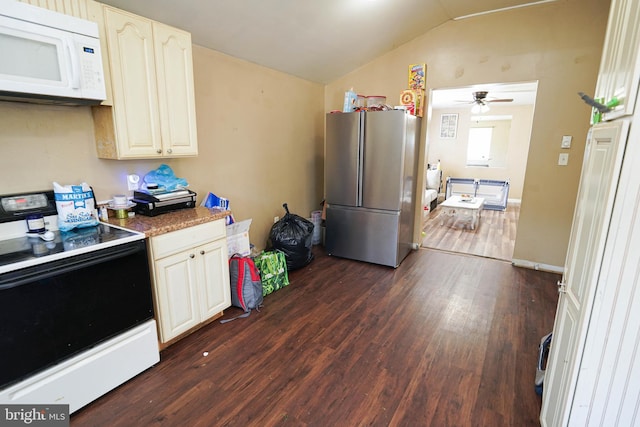 kitchen featuring white appliances, ceiling fan, vaulted ceiling, and wood-type flooring