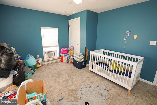 carpeted bedroom with ceiling fan, a nursery area, and cooling unit