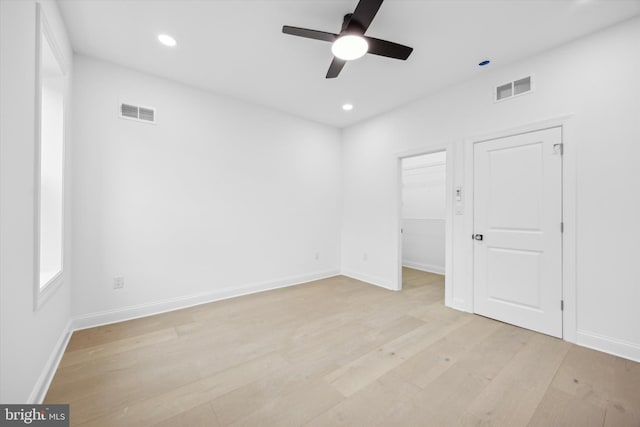 unfurnished bedroom with recessed lighting, visible vents, baseboards, and light wood-style floors