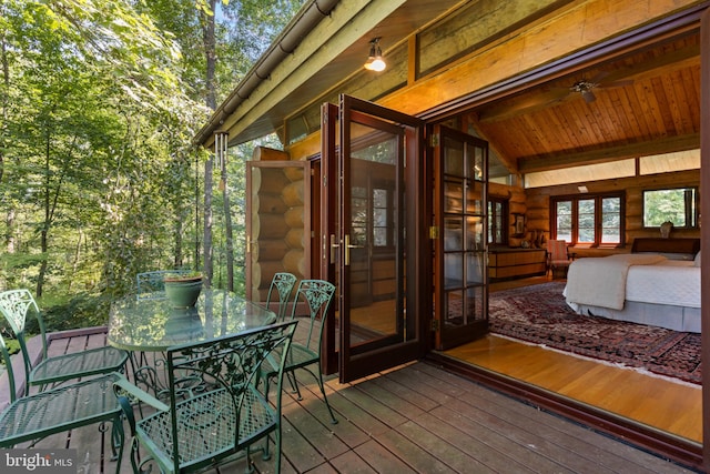 deck with outdoor dining space