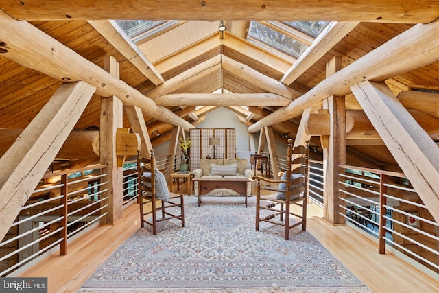 sitting room featuring wooden ceiling, wood finished floors, and lofted ceiling