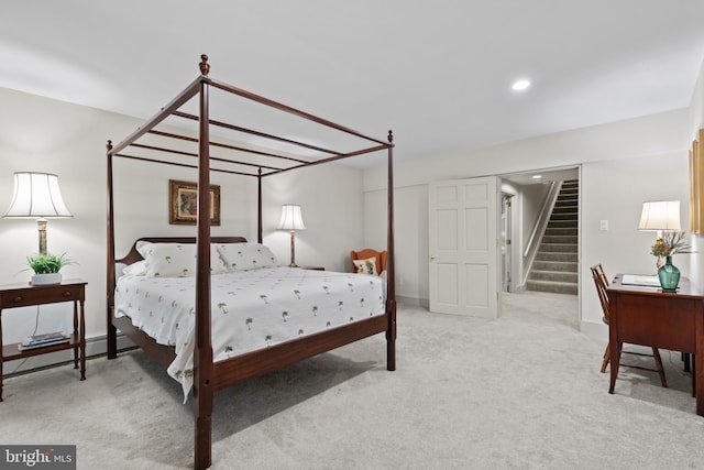 carpeted bedroom with baseboards, recessed lighting, and baseboard heating