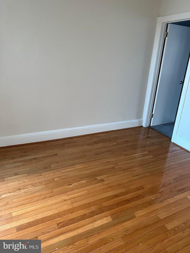 spare room featuring light hardwood / wood-style flooring