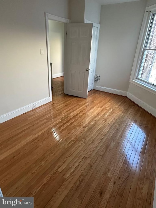 unfurnished bedroom featuring light hardwood / wood-style floors