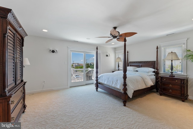 carpeted bedroom with ceiling fan and access to exterior