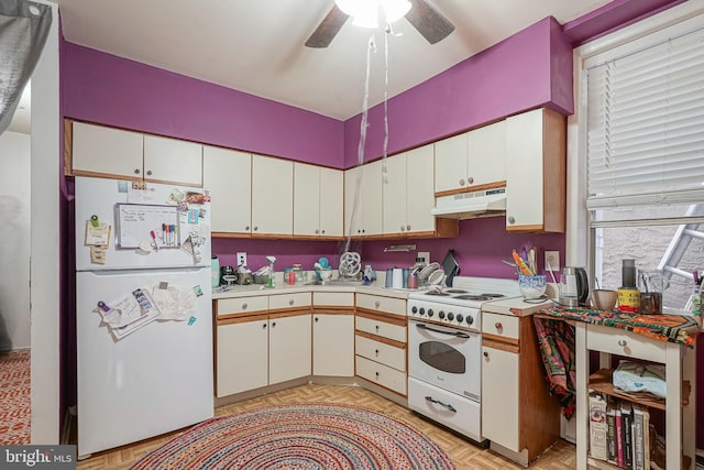 kitchen featuring white cabinets, ceiling fan, white appliances, and light parquet floors